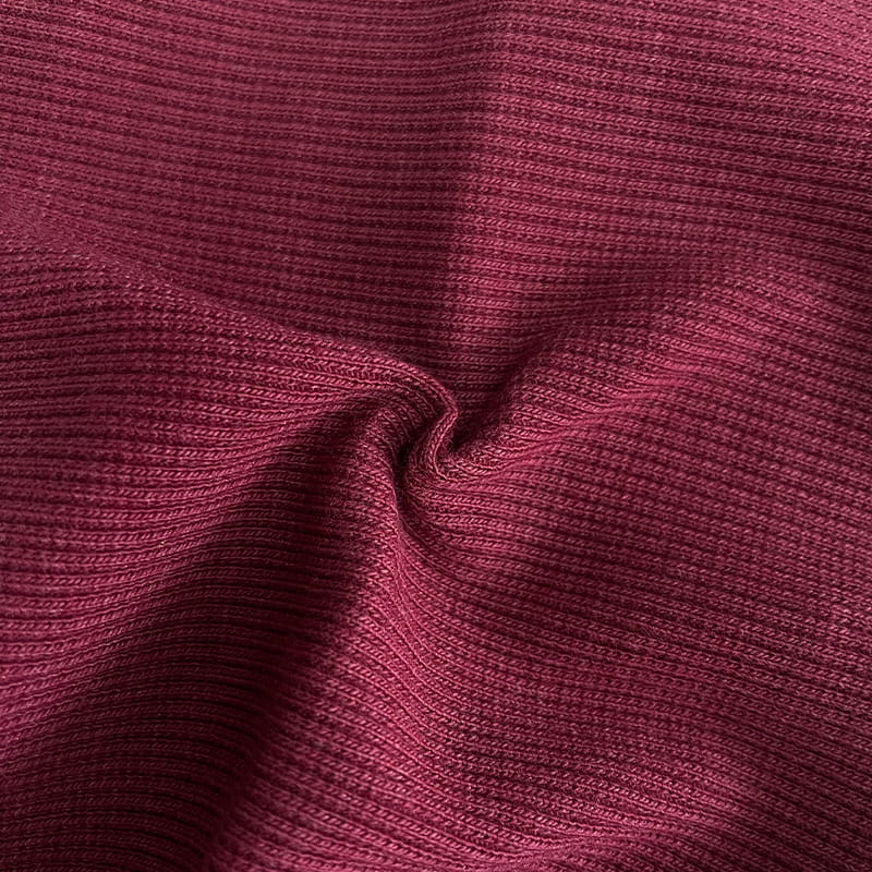 58% bomull 38% poly 45 spandex rib Myk hånd